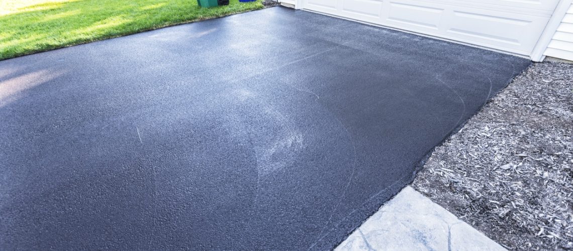 Newly Blacktop Sealed Asphalt Driveway
